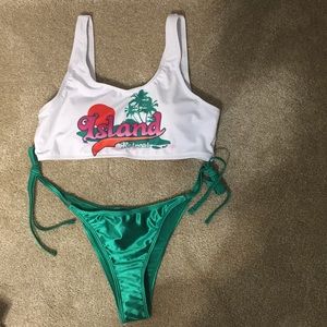 Island Retreat swim top with a green bottom.
